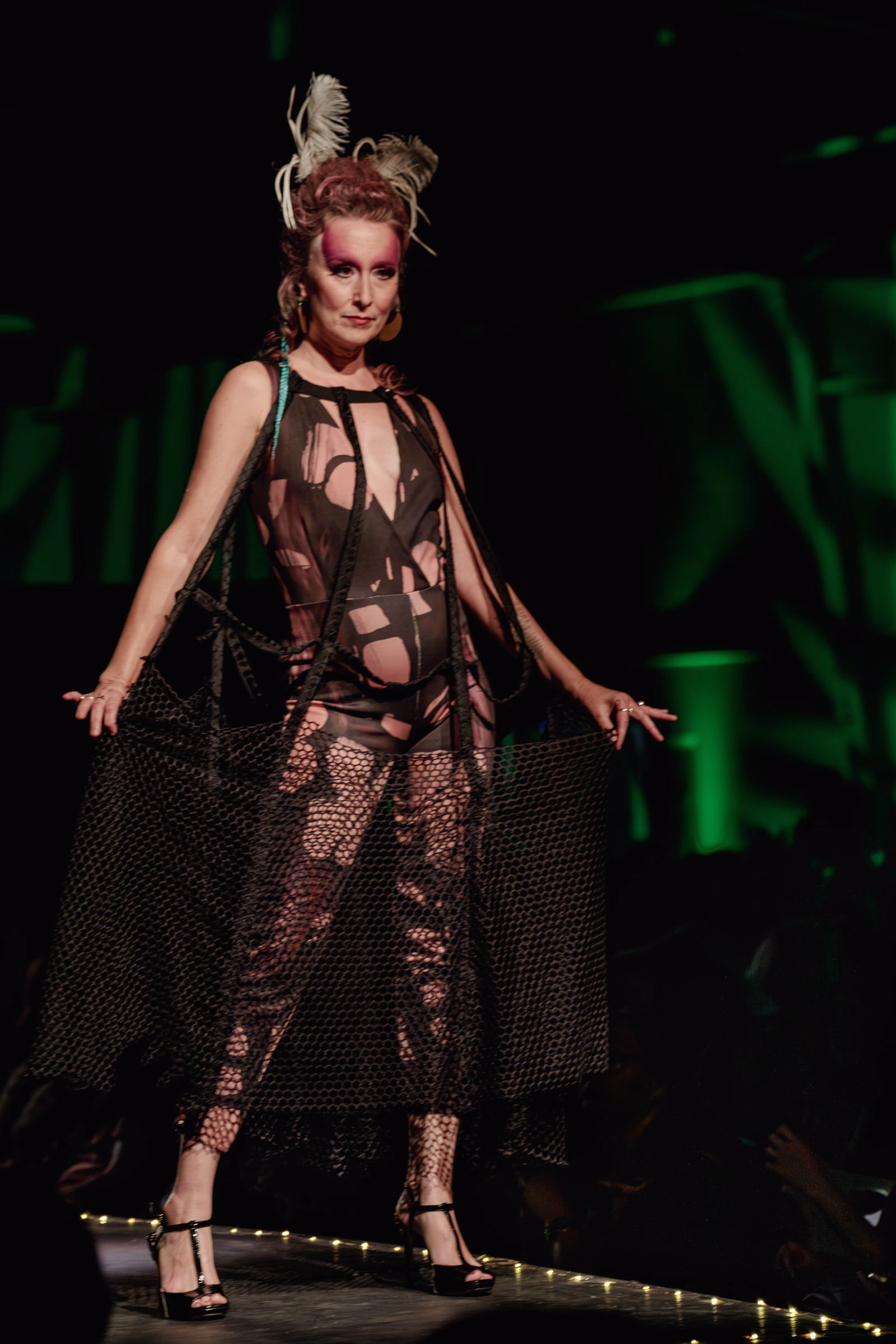 Model posing at the end of the runway during Beast Chikoko's Experimental Fashion Show, Oct 2025.