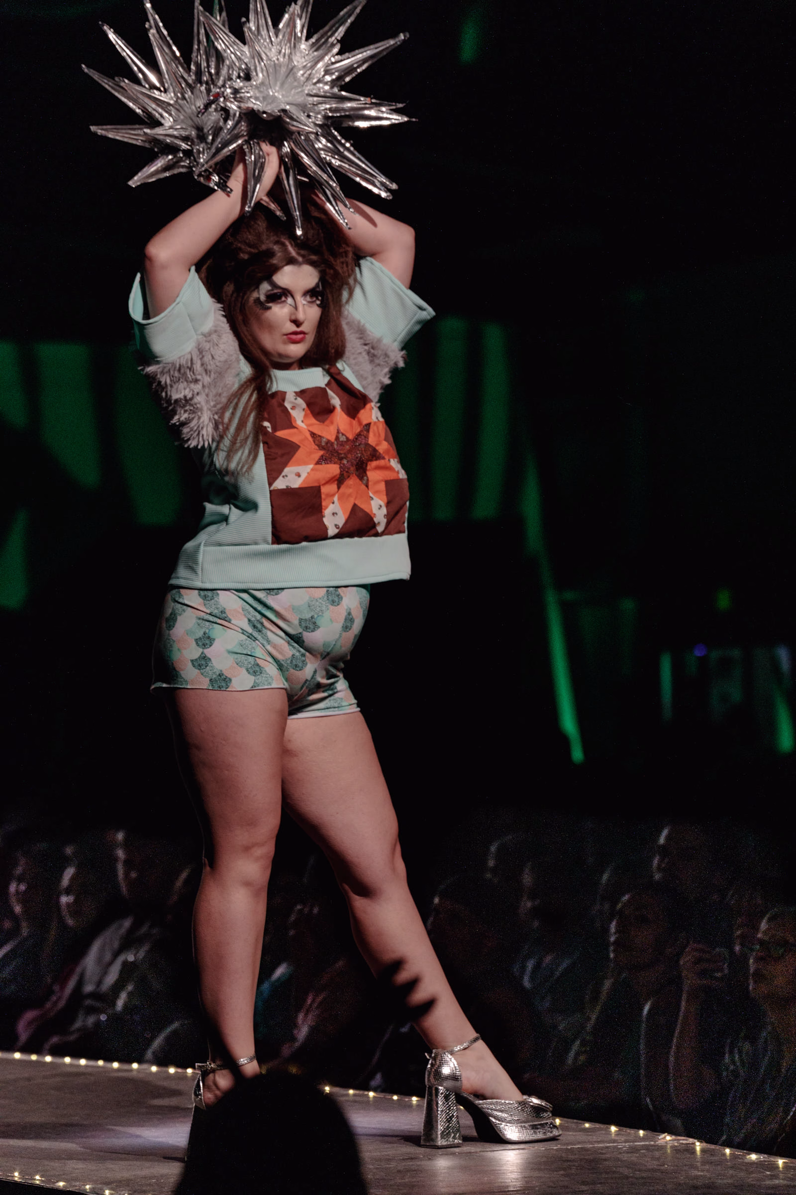 Model posing at the end of the runway during Beast Chikoko's Experimental Fashion Show, Oct 2025.